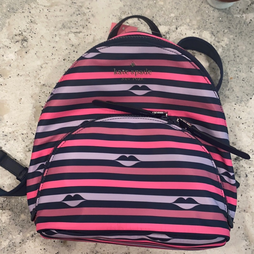 Kate spade lip being small book bag